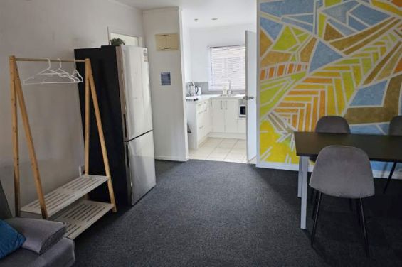 Family Courtyard Apt - lounge and dining table